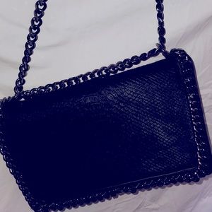 Must have Black Handbag. Gunmetal accents.